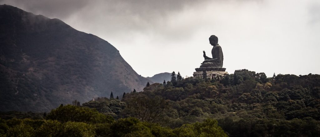 Tian Tan Buddha statue on top of mountain in Hong Kong